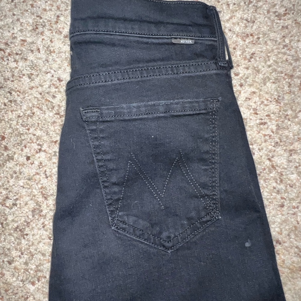 Mother jeans. Distressed at knees and fringe on ends
